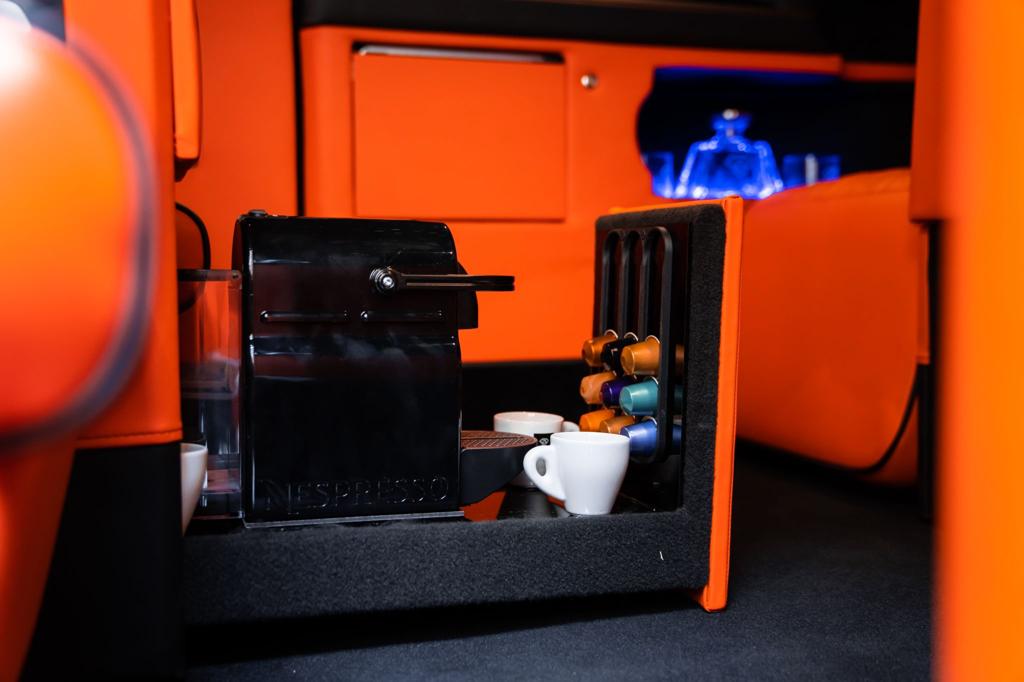 Premium coffee machine and refreshments inside a luxury VIP chauffeur vehicle from All Stars Chauffeur in London and the UK.