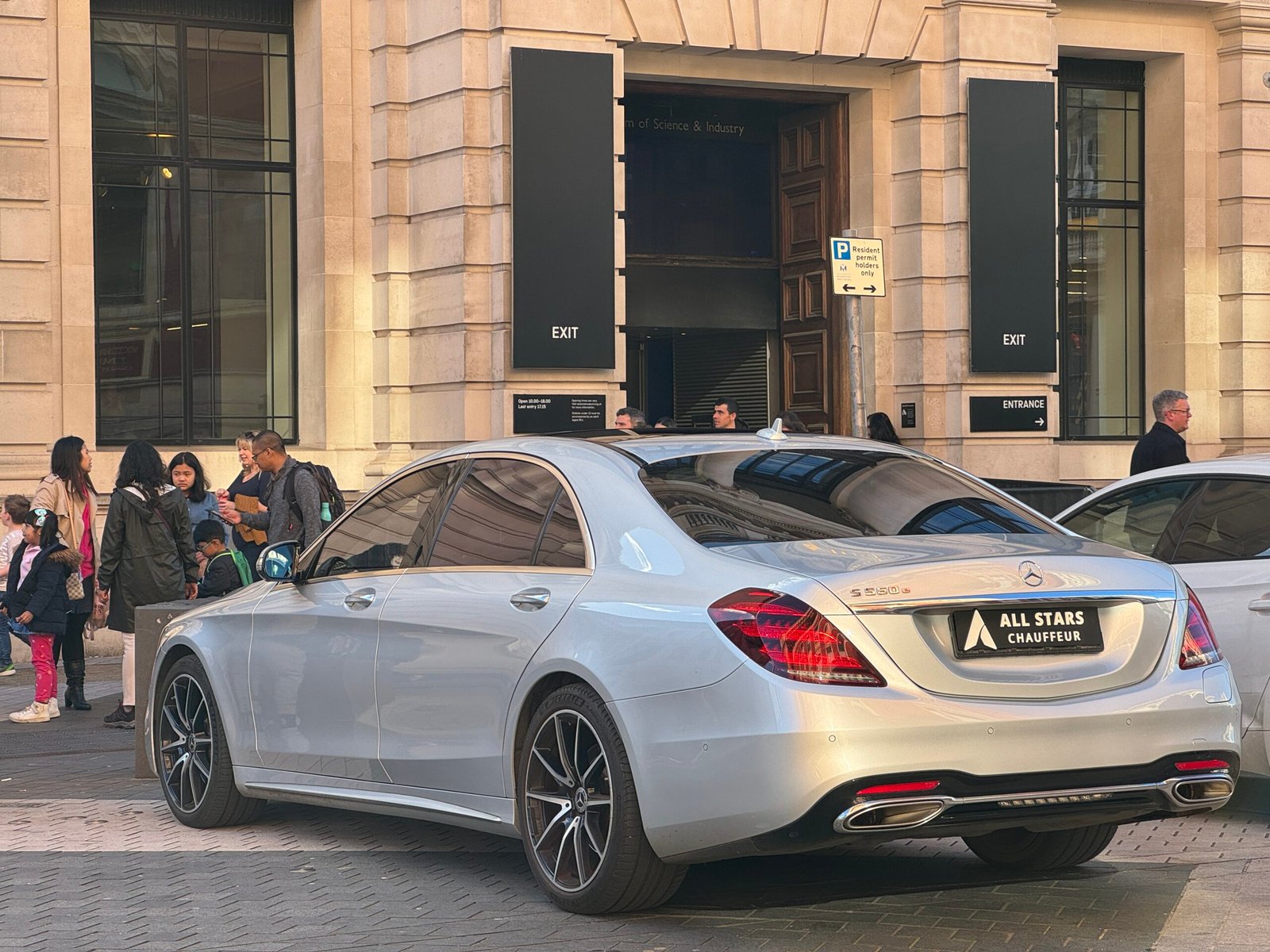 silver-mercedes-sclass-from-rear