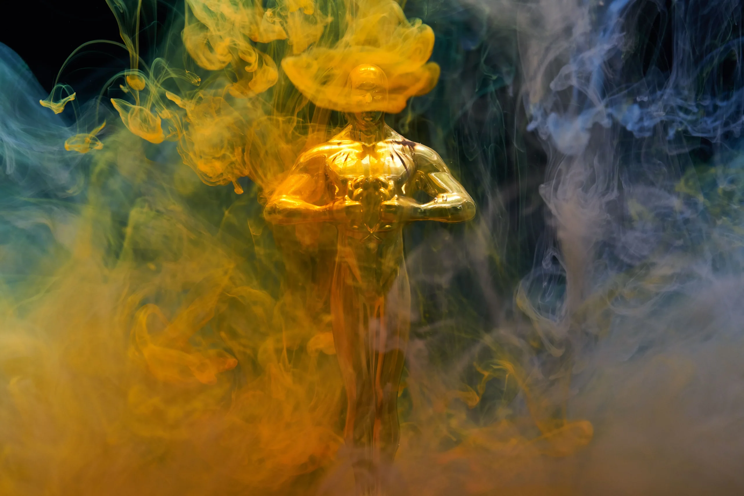 BAFTA Awards-inspired golden trophy surrounded by dramatic smoke, representing VIP chauffeur and luxury event transportation in London.